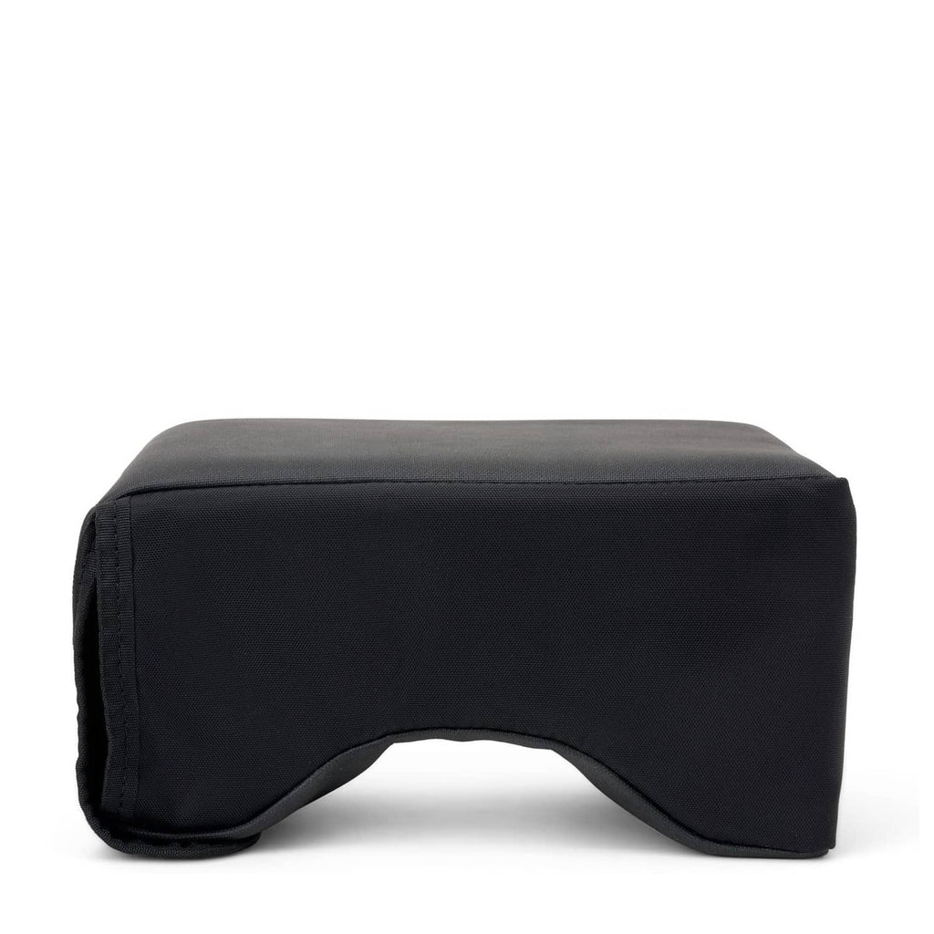 Black ergonomic lap pad with curved front cutout and padded top surface