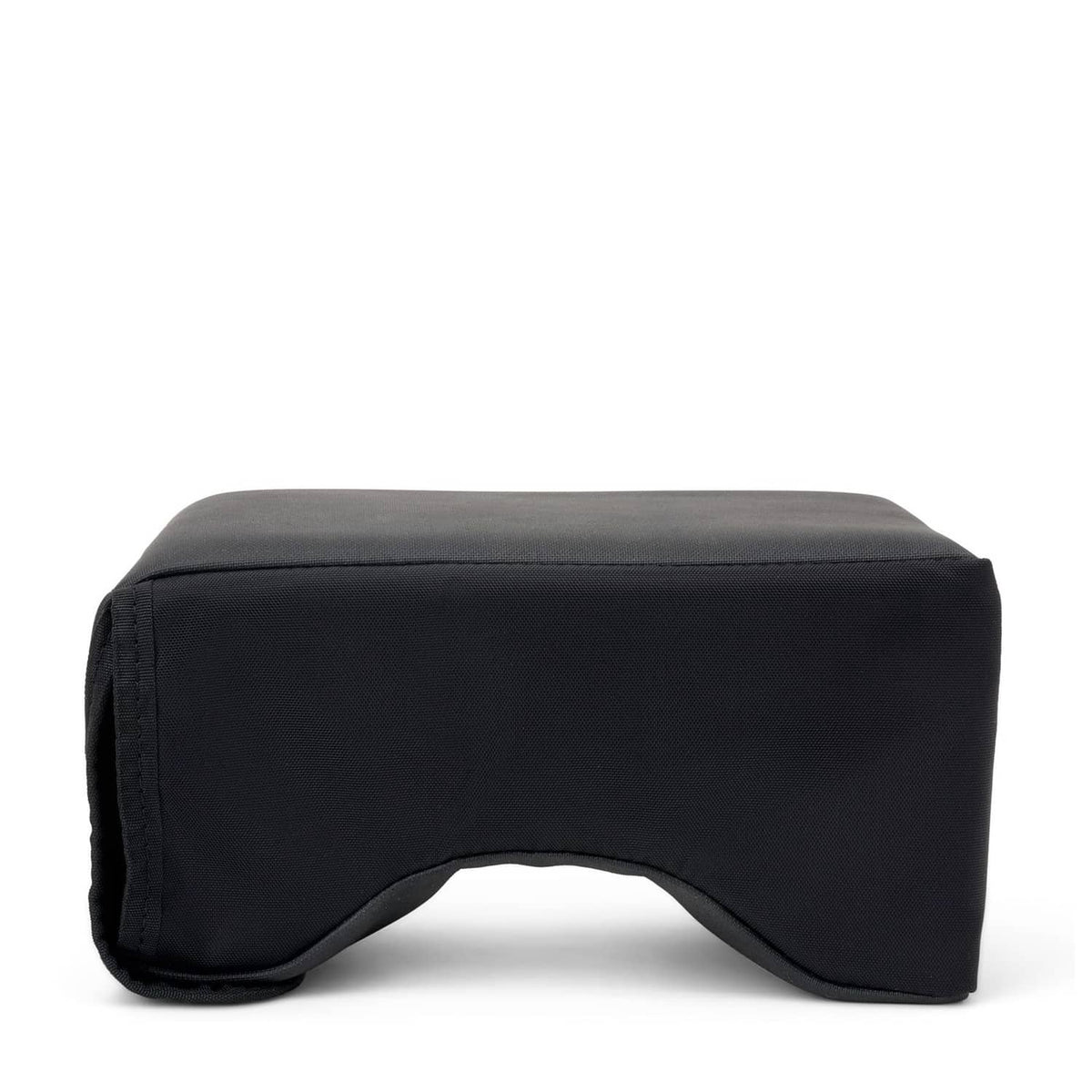 Black ergonomic lap pad with curved front cutout and padded top surface