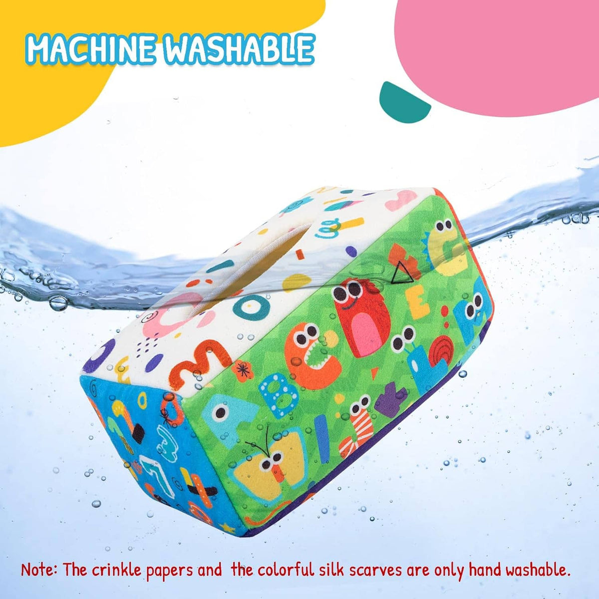 Colorful fabric tissue box toy shown above water droplets for machine washable use