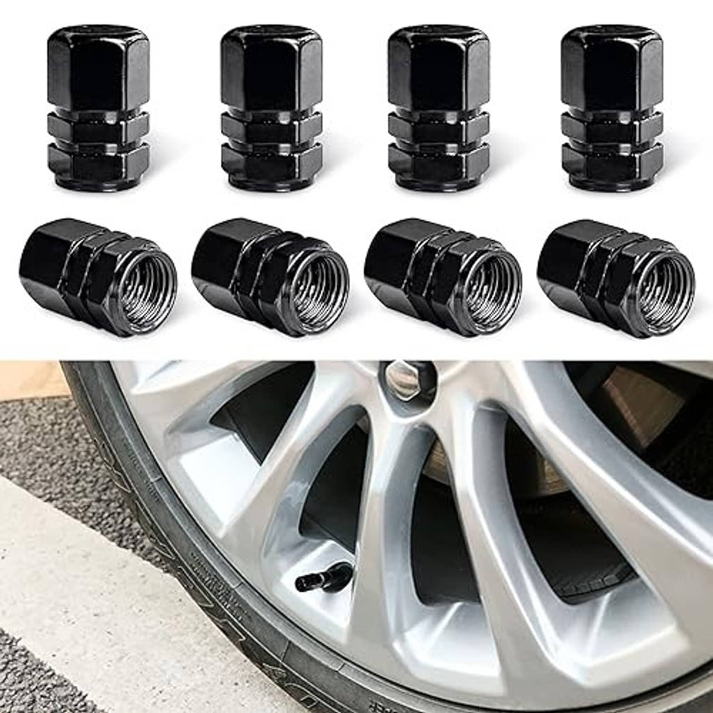 Black valve stem caps set, threaded metal caps shown above silver wheel rim