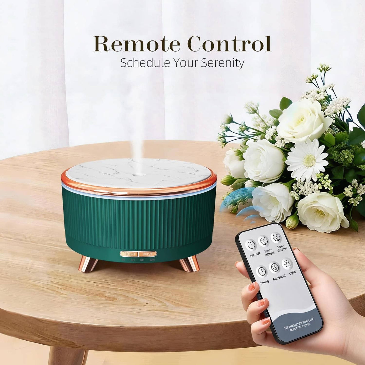 Teal essential oil diffuser with marble top and handheld remote control