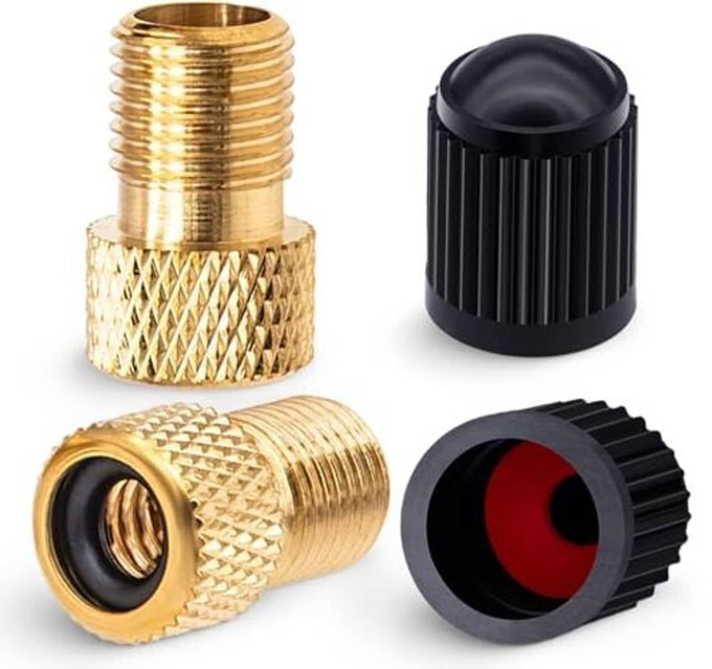 Brass Presta valve adapter set with black rubber inserts and matching black ribbed caps