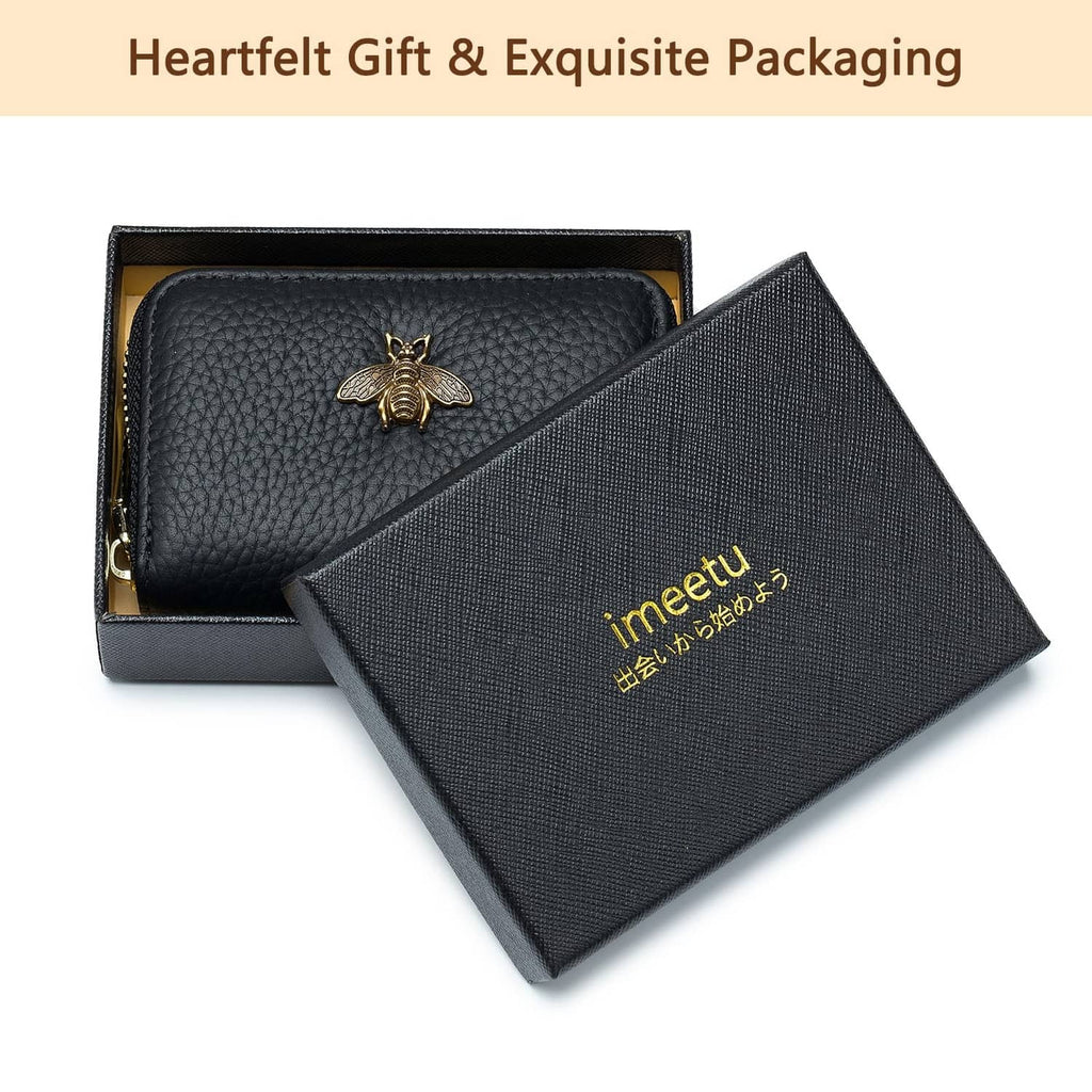 Black leather zipper card case with gold bee charm in gift box and cover
