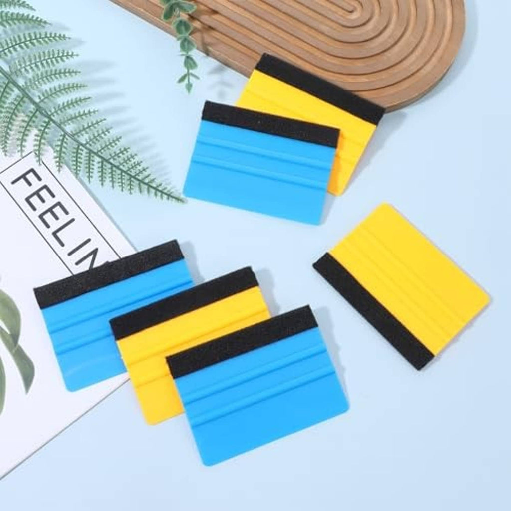 Assorted felt-edge squeegees in blue and yellow with black scraper strip