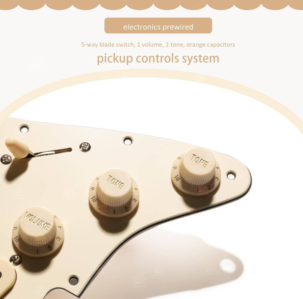 Cream prewired guitar pickguard close-up with volume and tone knobs