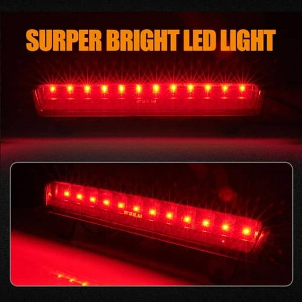 Illuminated LED high-mount stop light showing a bright red light bar through clear lens
