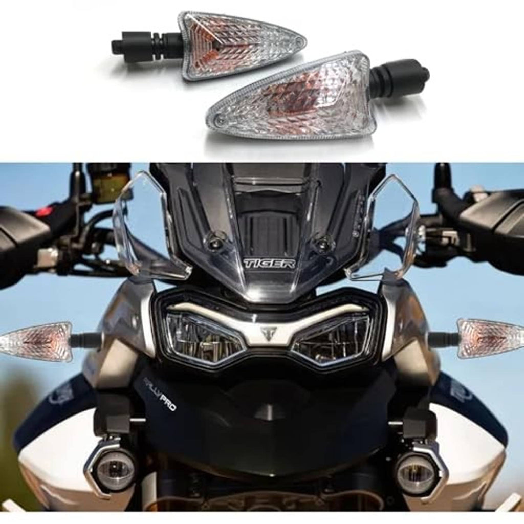 Front motorcycle turn signal lights with clear lenses and amber reflectors, mounted on handlebar