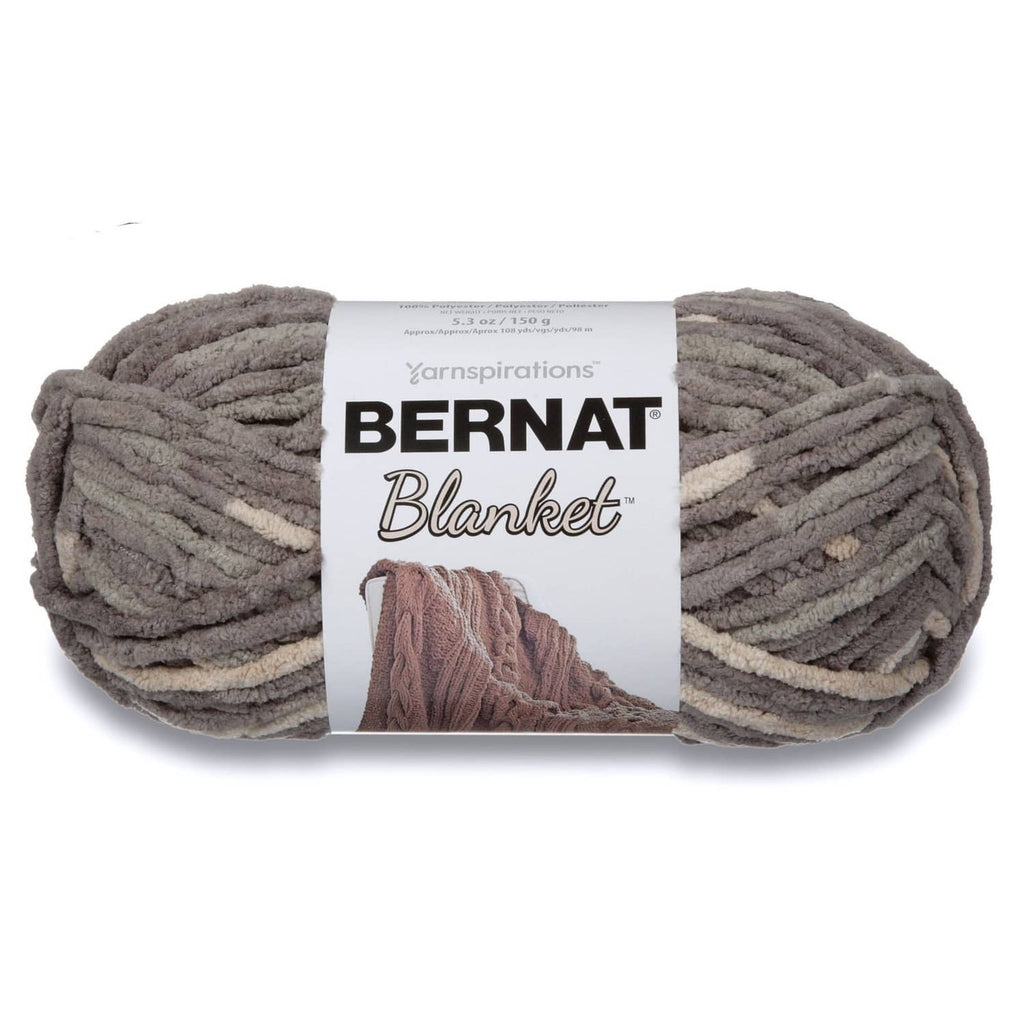 Super bulky chenille-style yarn skein with dark gray and light stripe accents, 150g