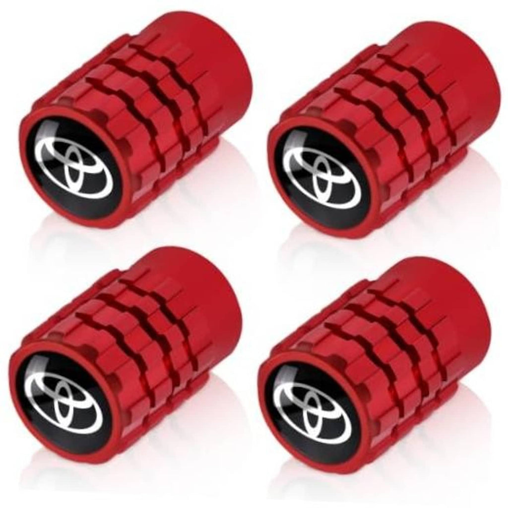 Four red tire valve stem caps with Toyota logo emblem, cylindrical design