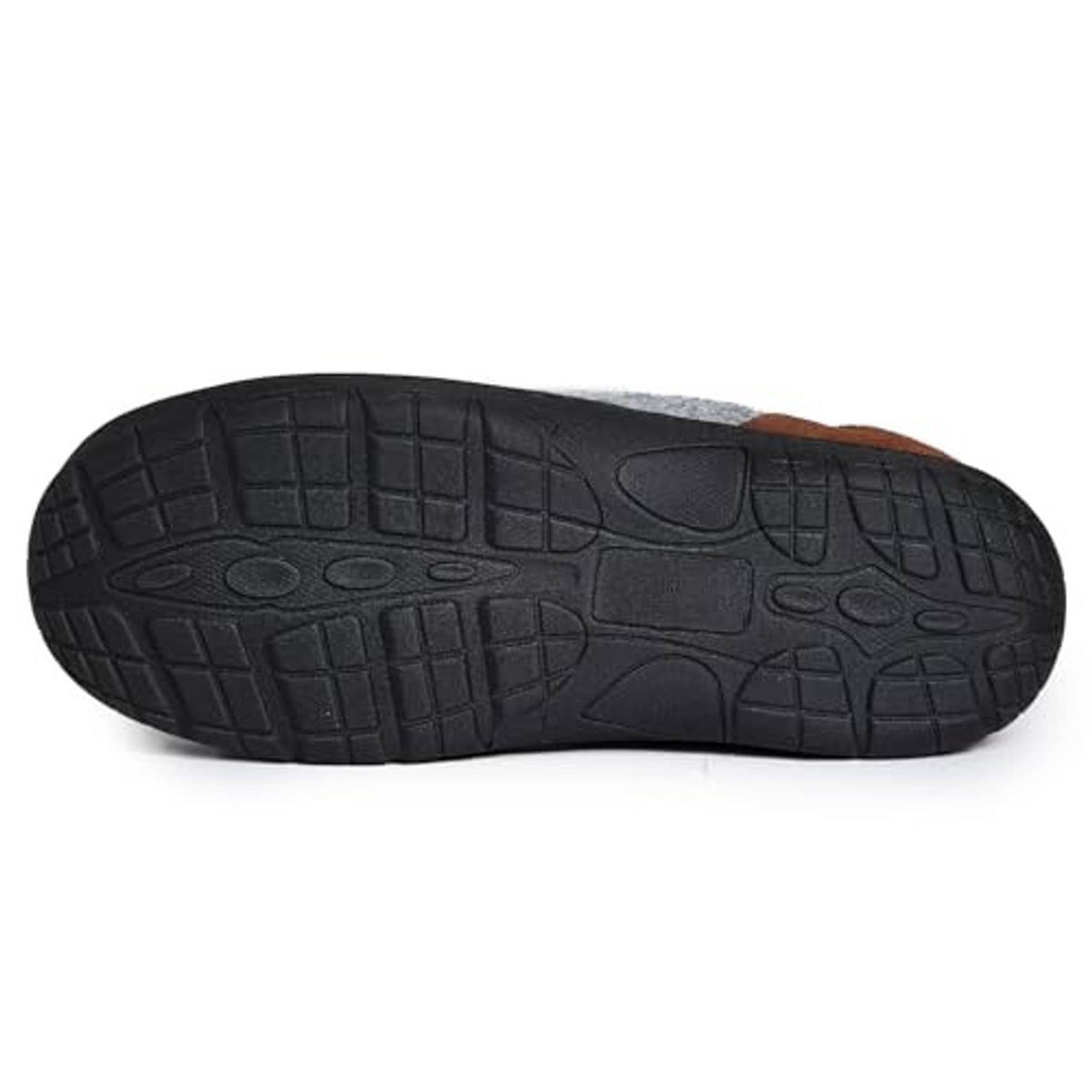 Black treaded outsole of light grey fleece clog slippers with brown edge