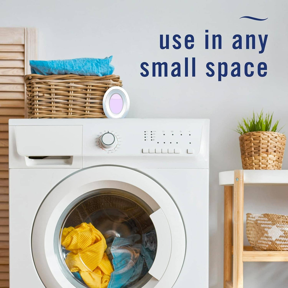Plug-in air freshener device with lavender round insert on a small-space appliance