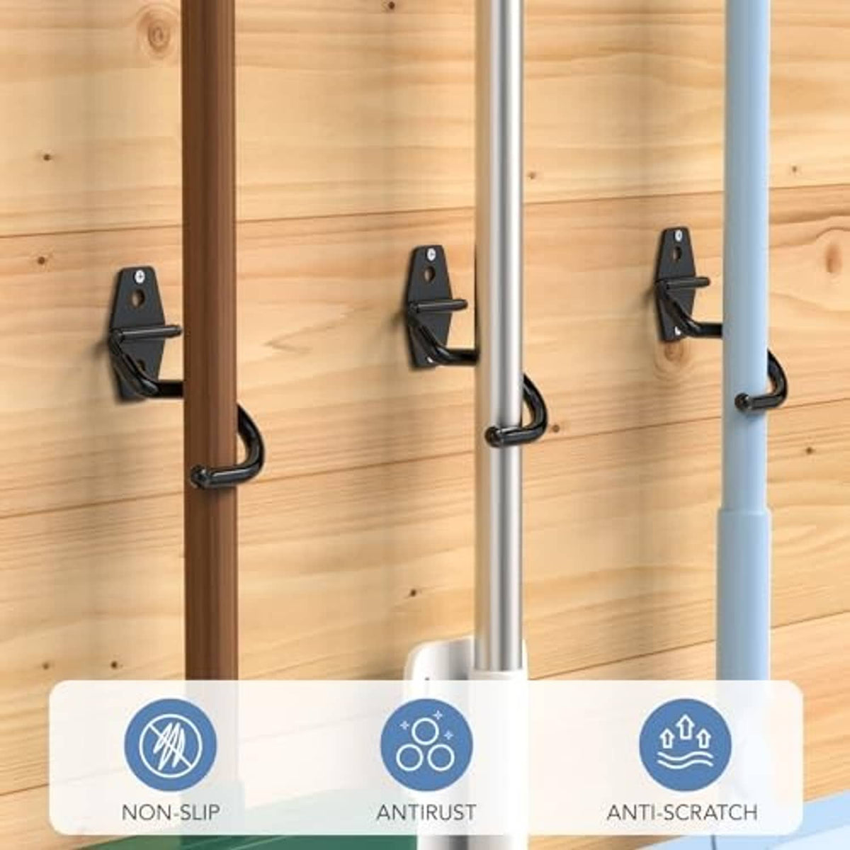 Black wall hooks with S-shaped arms and mounting plates for hanging tools