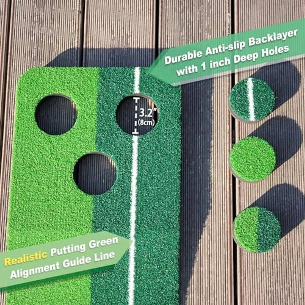 Green putting mat close-up with three circular holes and white alignment line