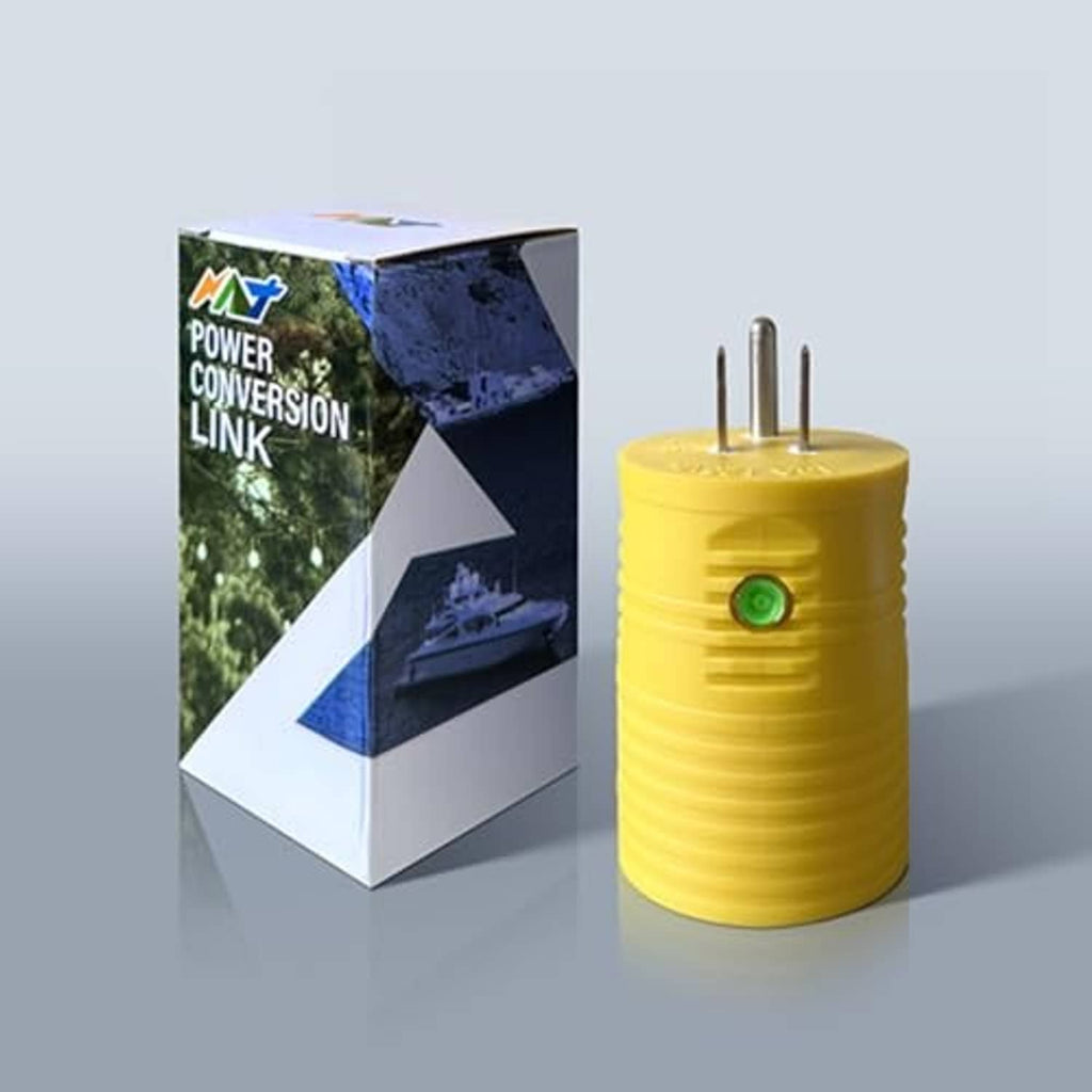 Yellow power adapter with two male prongs and green LED indicator on the cylinder body
