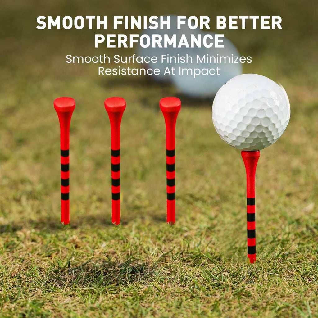 Red golf tees with black striped shafts and smooth heads, with one near a golf ball