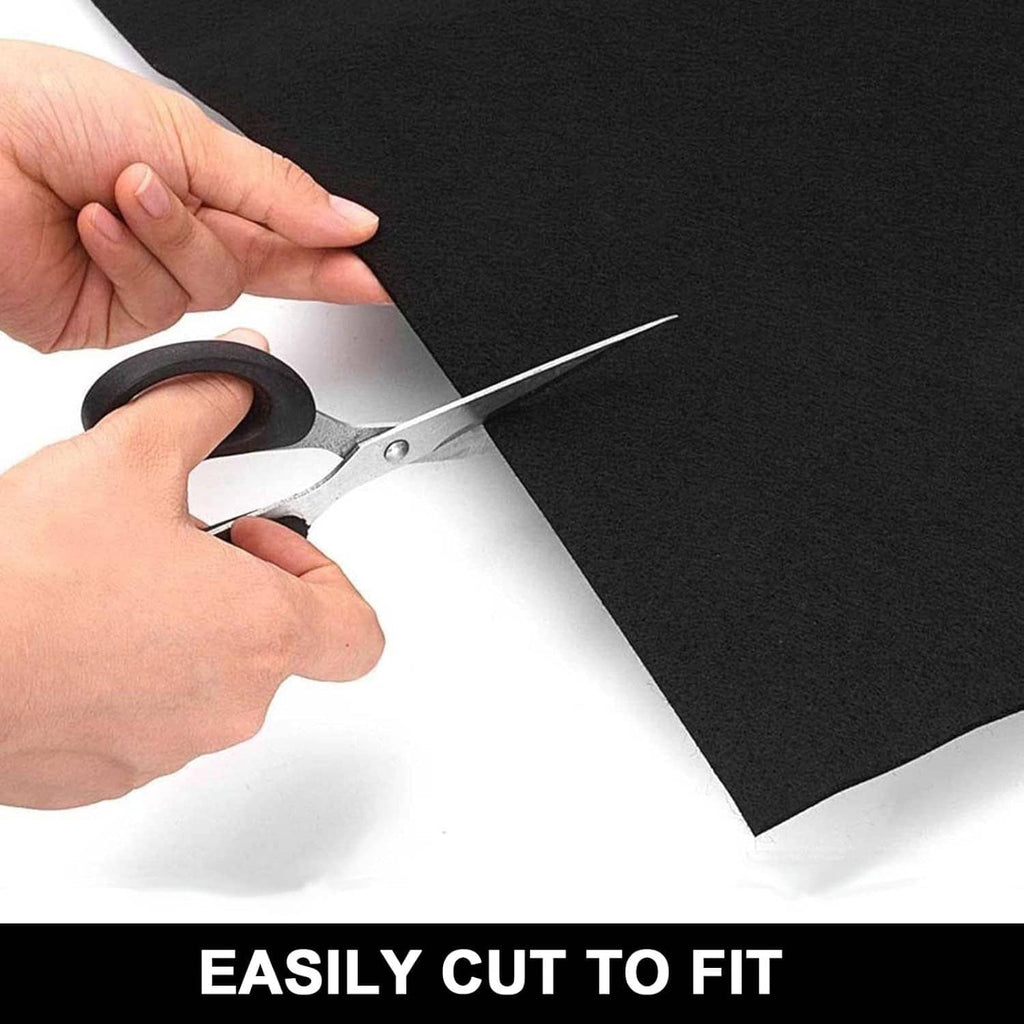 Black oil spill mat cut with scissors for custom size