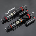 Front air shock absorber set with black body, red adjusters, coil springs and brackets