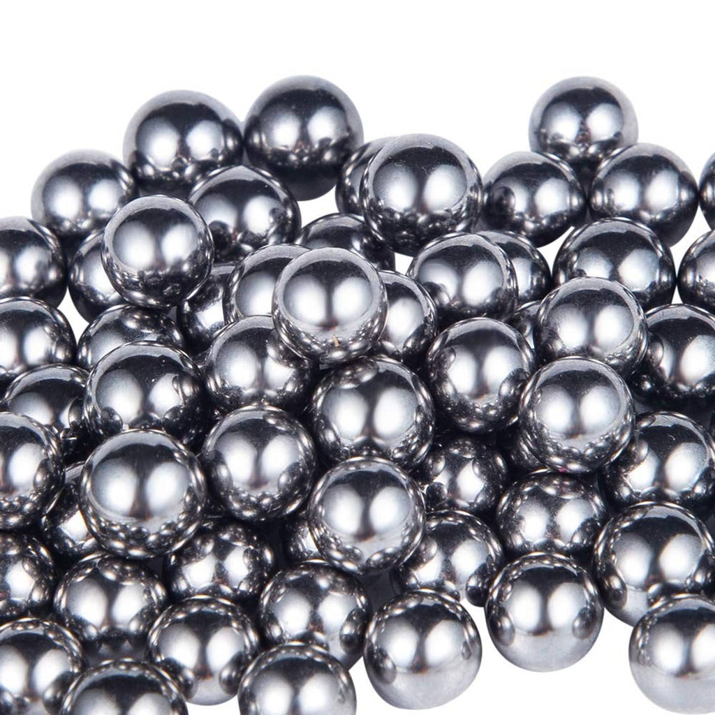 Chrome steel bearing balls, shiny dark-silver spheres in bulk