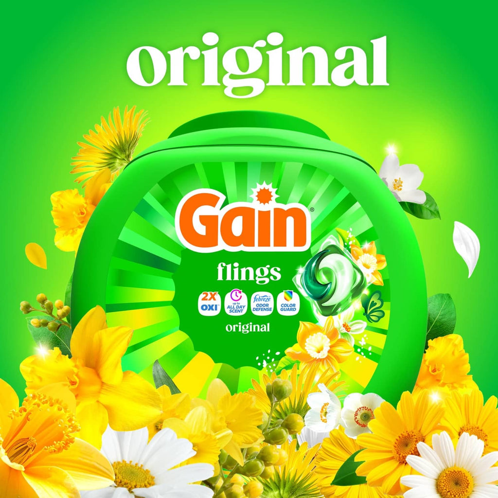 Green Gain flings detergent pod tub surrounded by yellow and white flowers