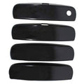 Set of four glossy black rectangular trim covers with circular mounting hole