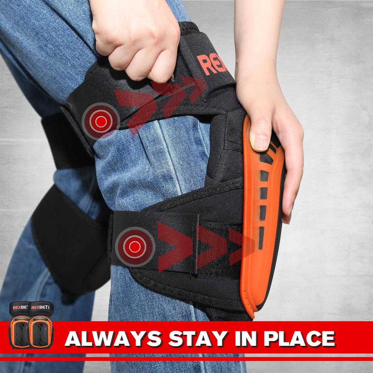 Black knee pad with orange side shell, fastened strap, and padded back for secure fit