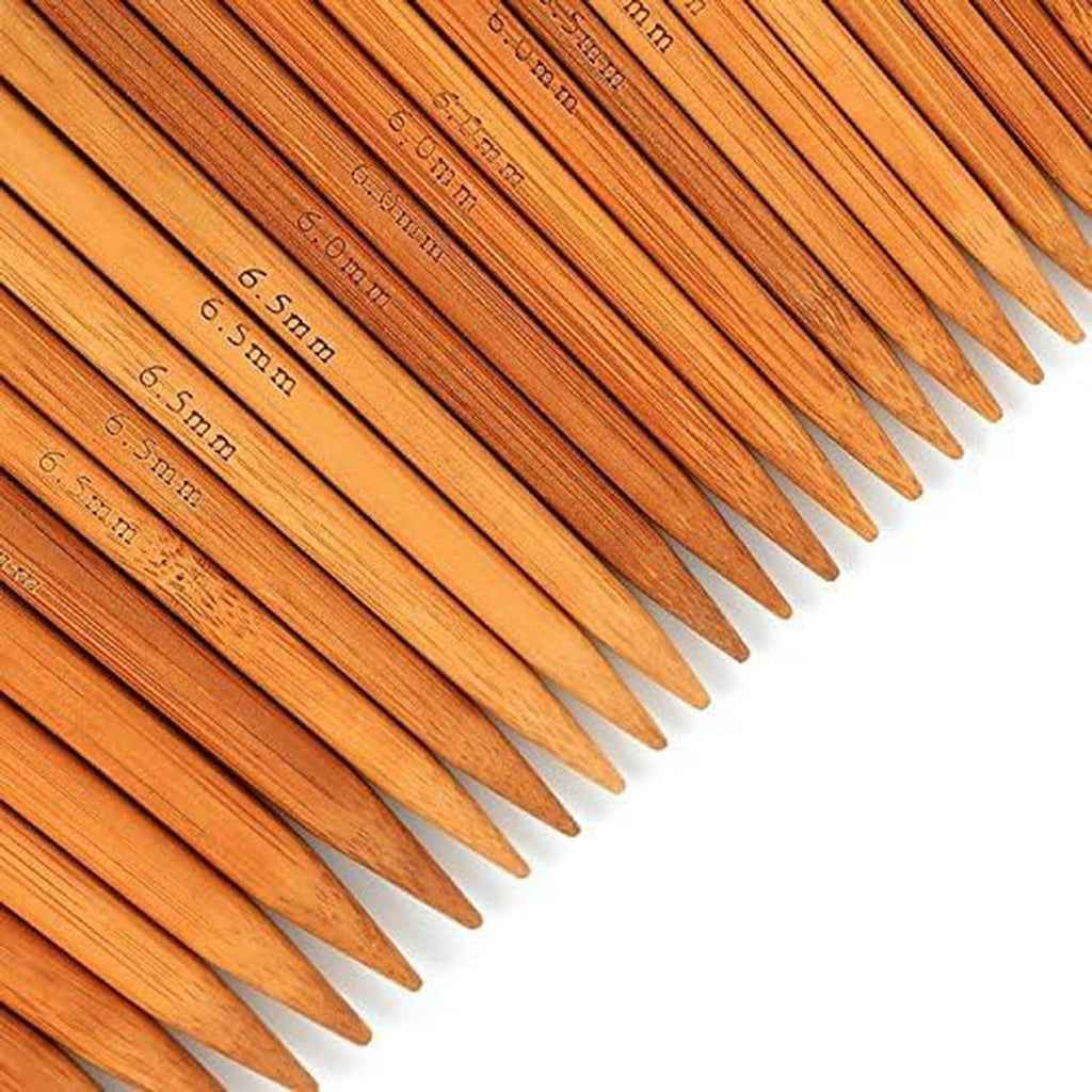 Close-up of bamboo double-pointed knitting needle tips with engraved measurements
