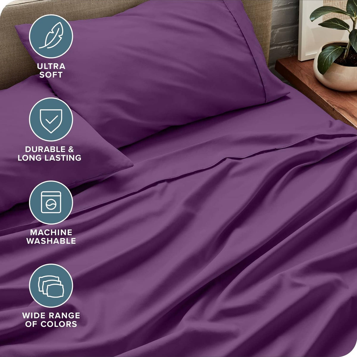 Plum twin fitted sheet and pillowcases with smooth, wrinkle-like fabric texture