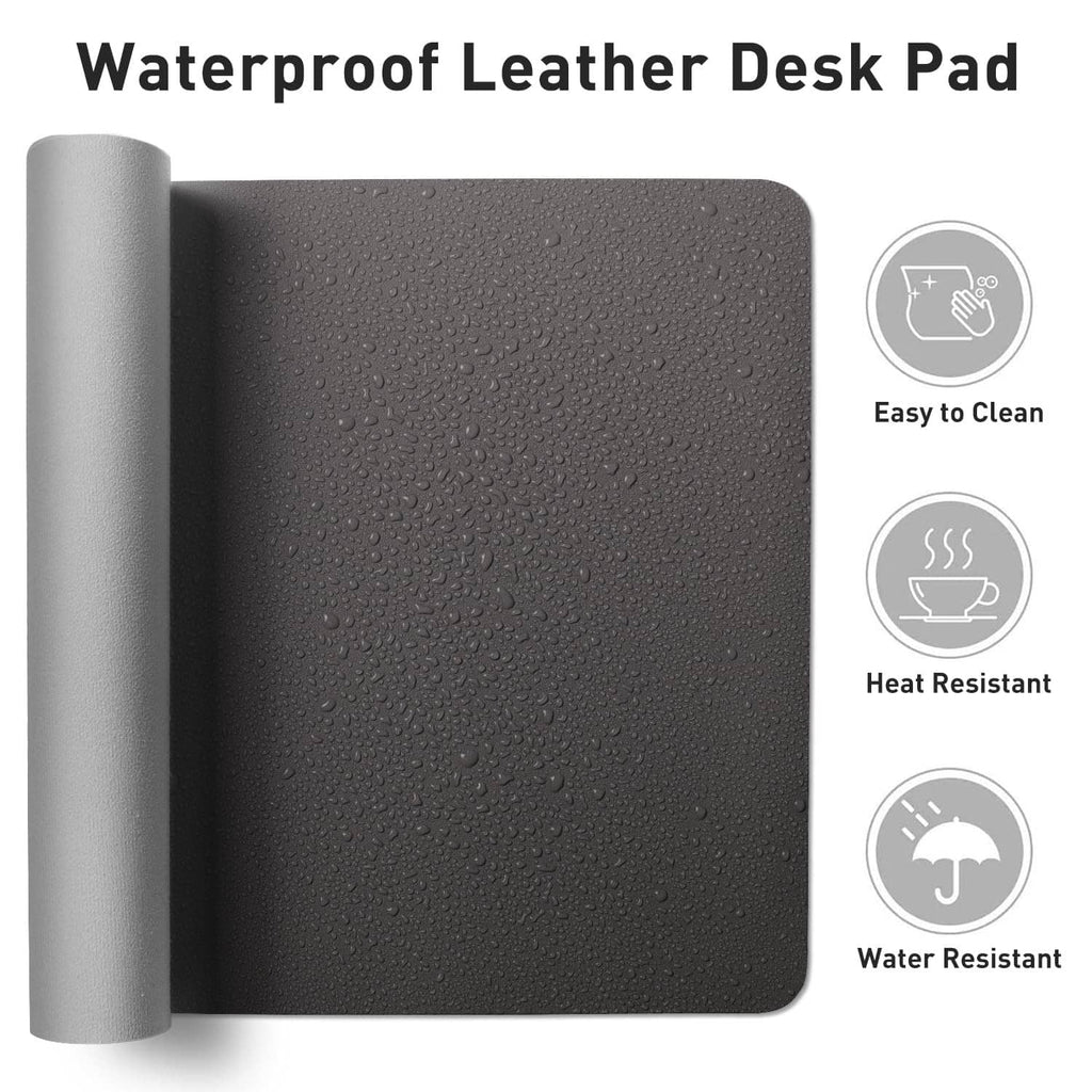 Gray water-resistant desk pad with droplet texture and rolled-up backing