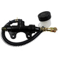 Rear brake master cylinder pump with fluid reservoir and linkage, black and gold.