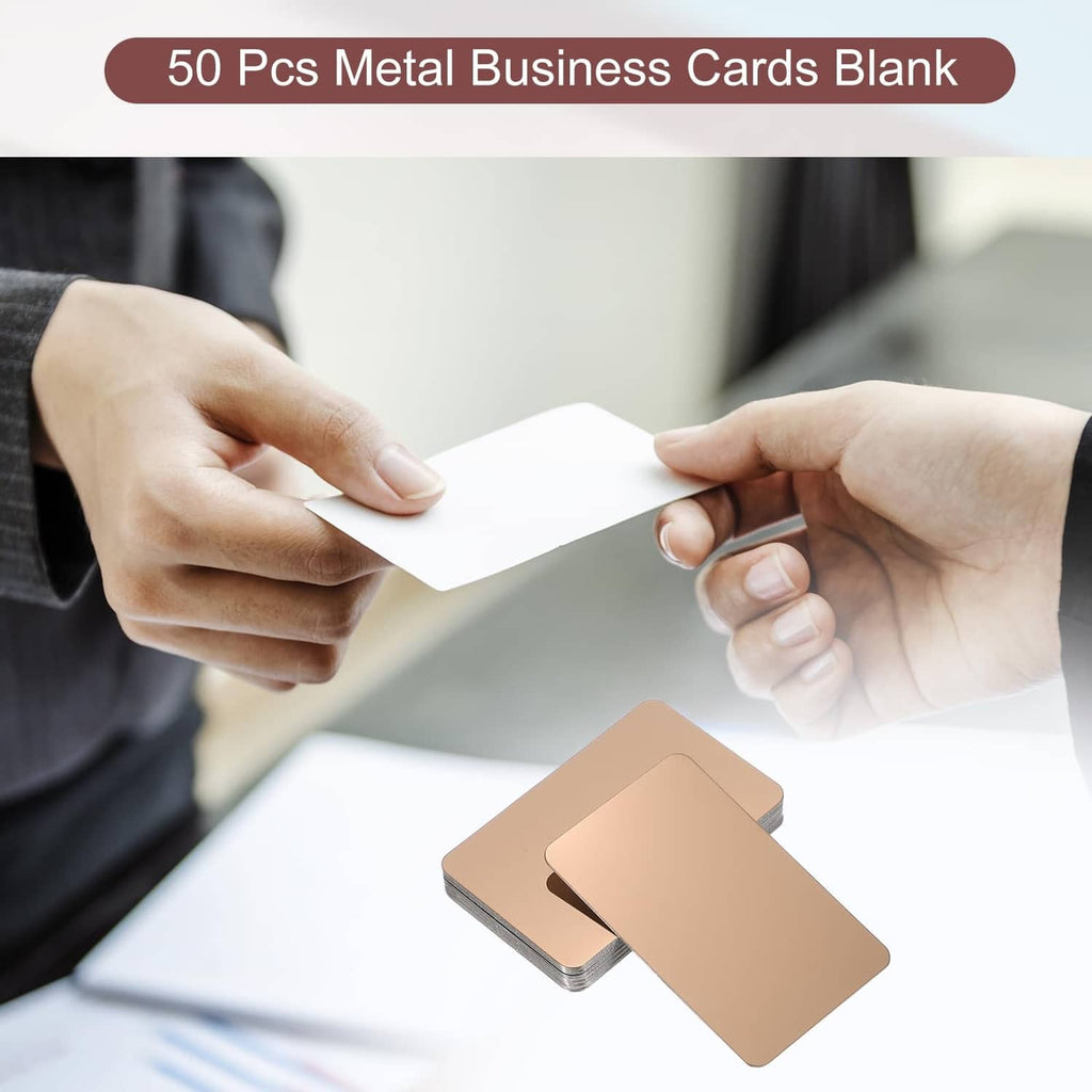 Rose gold metal business cards blank in hand, ready to write or customize