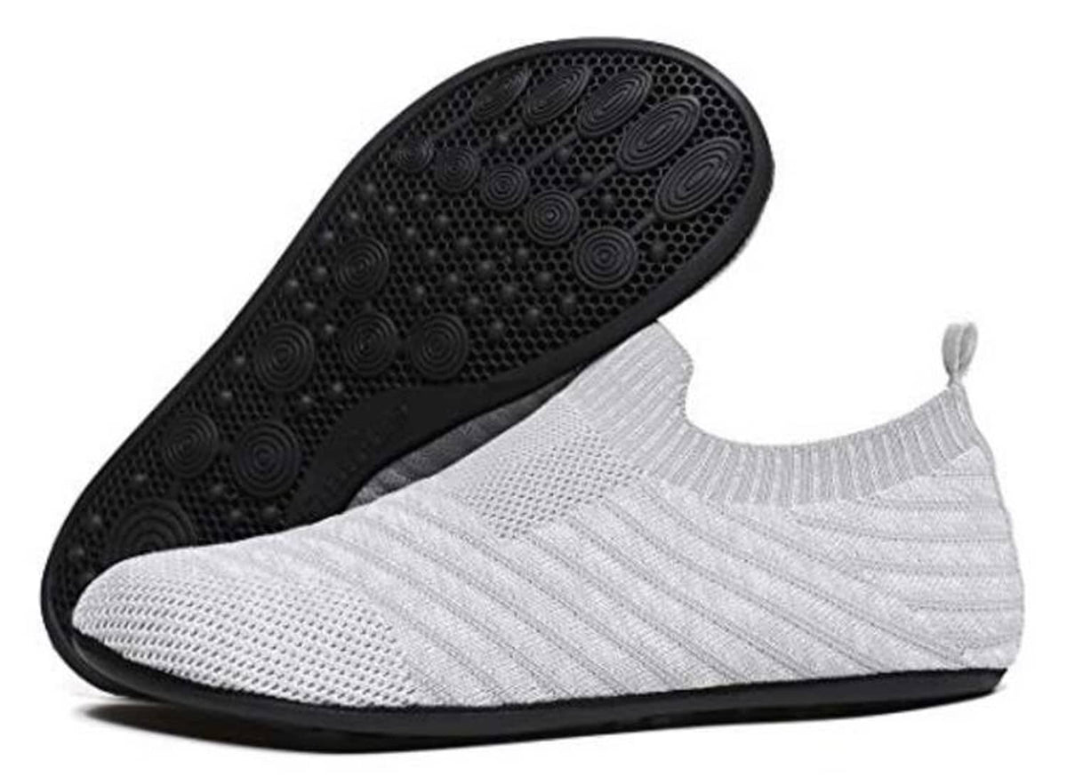 Light gray slip-on house shoe with visible textured black tread outsole