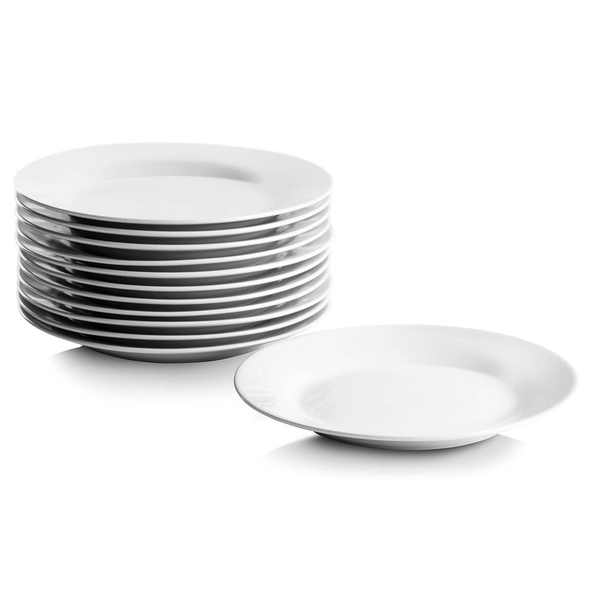 Stacked white round shallow dessert plates with one serving plate