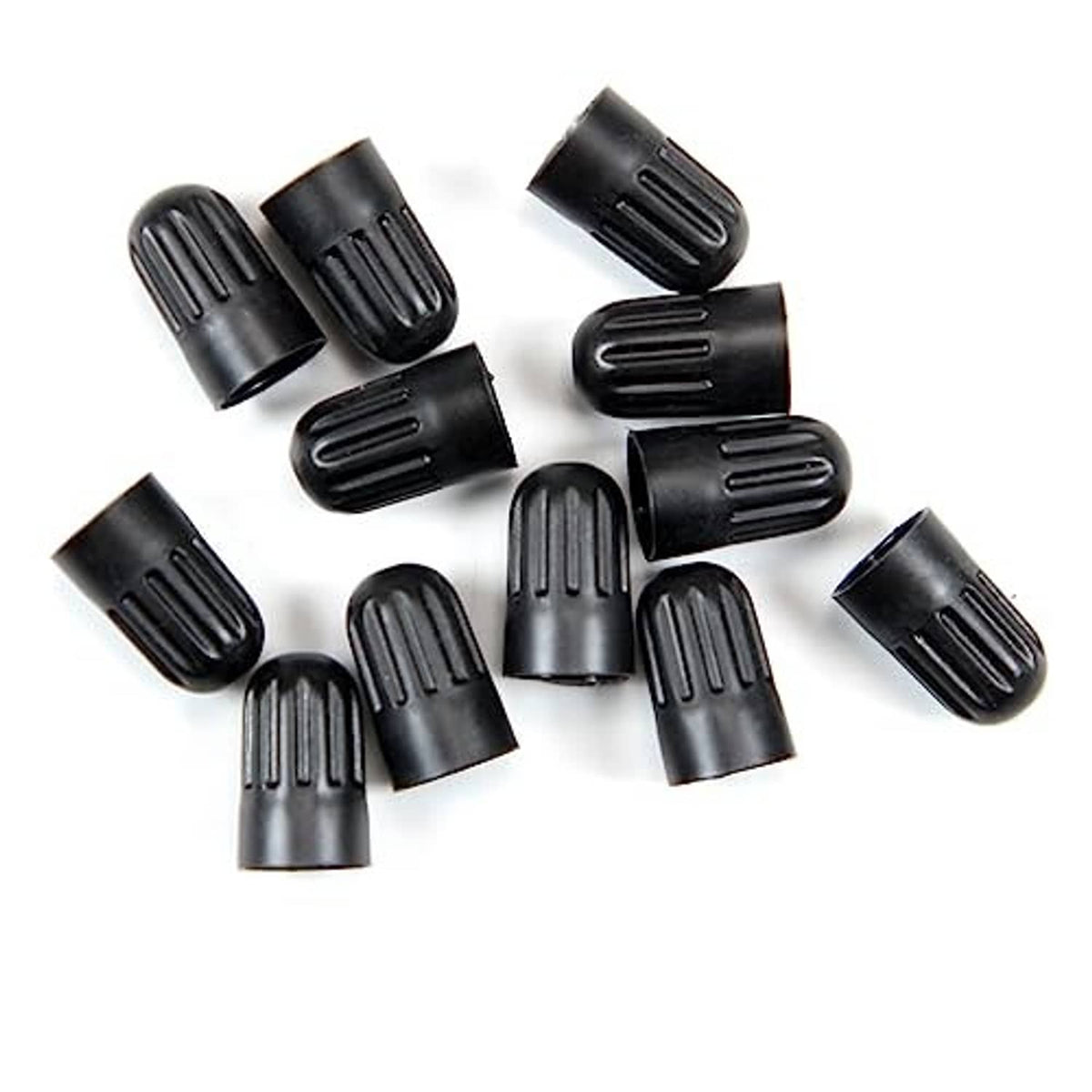 Black long tire valve stem caps, grouped on a white background