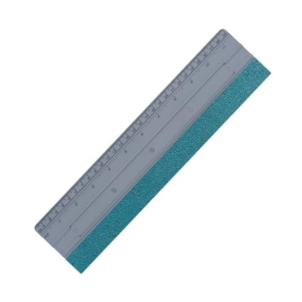 Car window felt squeegee tool, diagonal view of gray ruler and blue felt edge