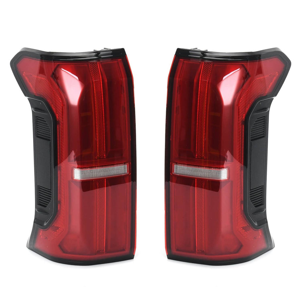 Left and right rear tail lights with red lenses and white strip reflectors, black sides