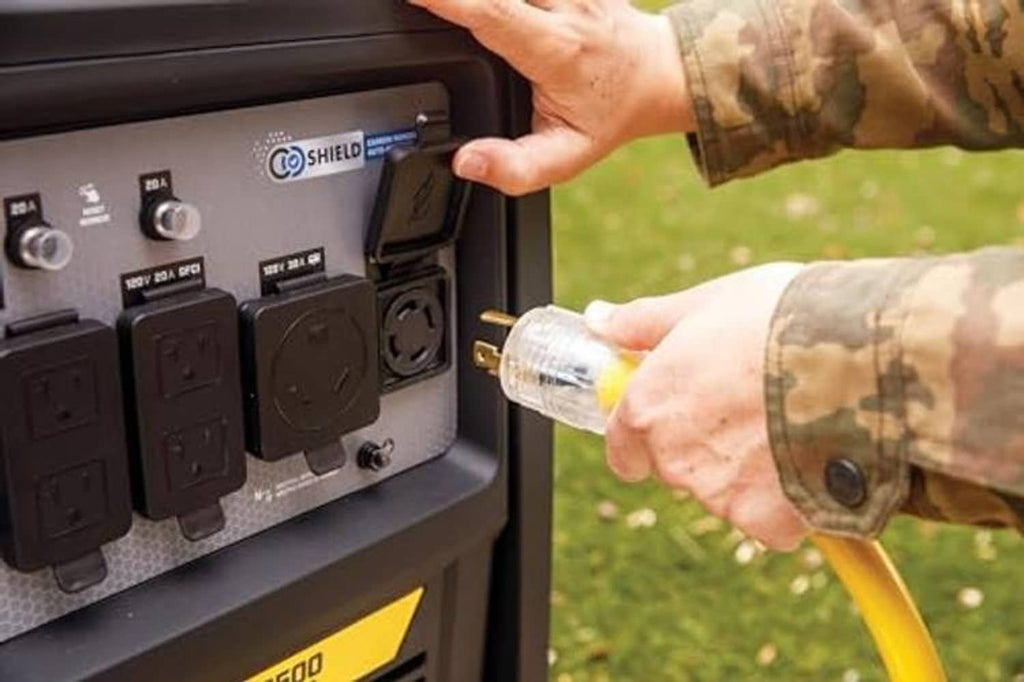 Yellow adapter cord being plugged into generator outlet with black sockets