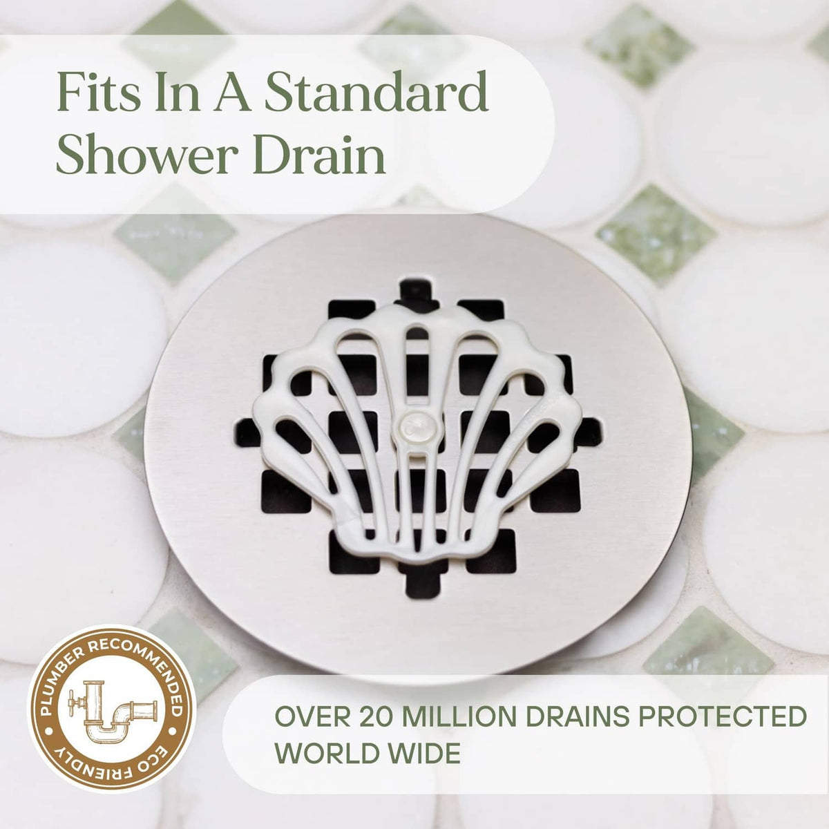White shower drain hair catcher fitting a standard shower drain opening