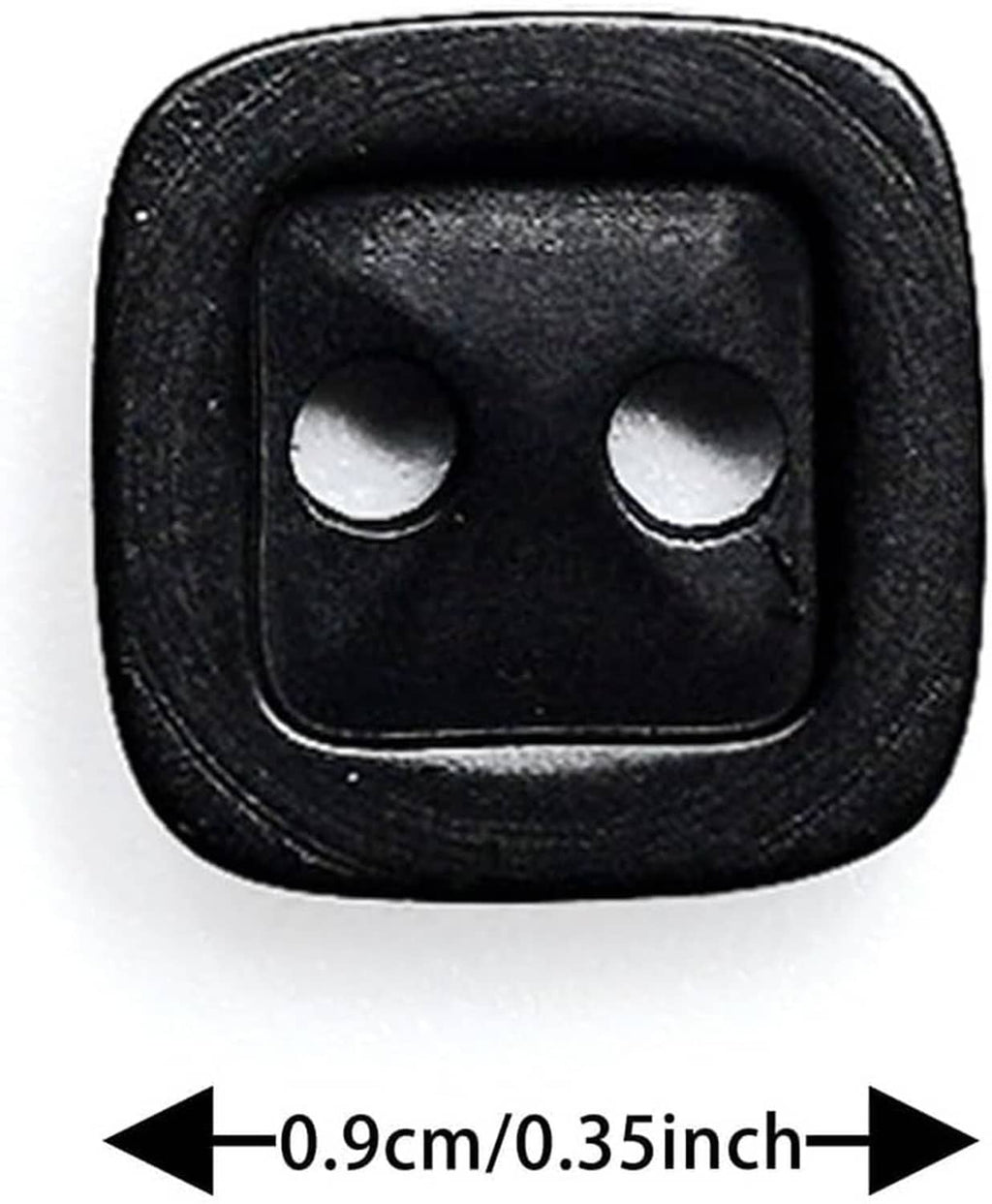 Black square 2-hole resin button close-up, textured black border with two light holes