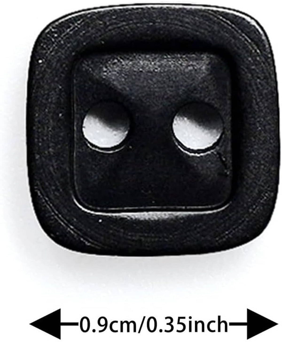 Black square 2-hole resin button close-up, textured black border with two light holes
