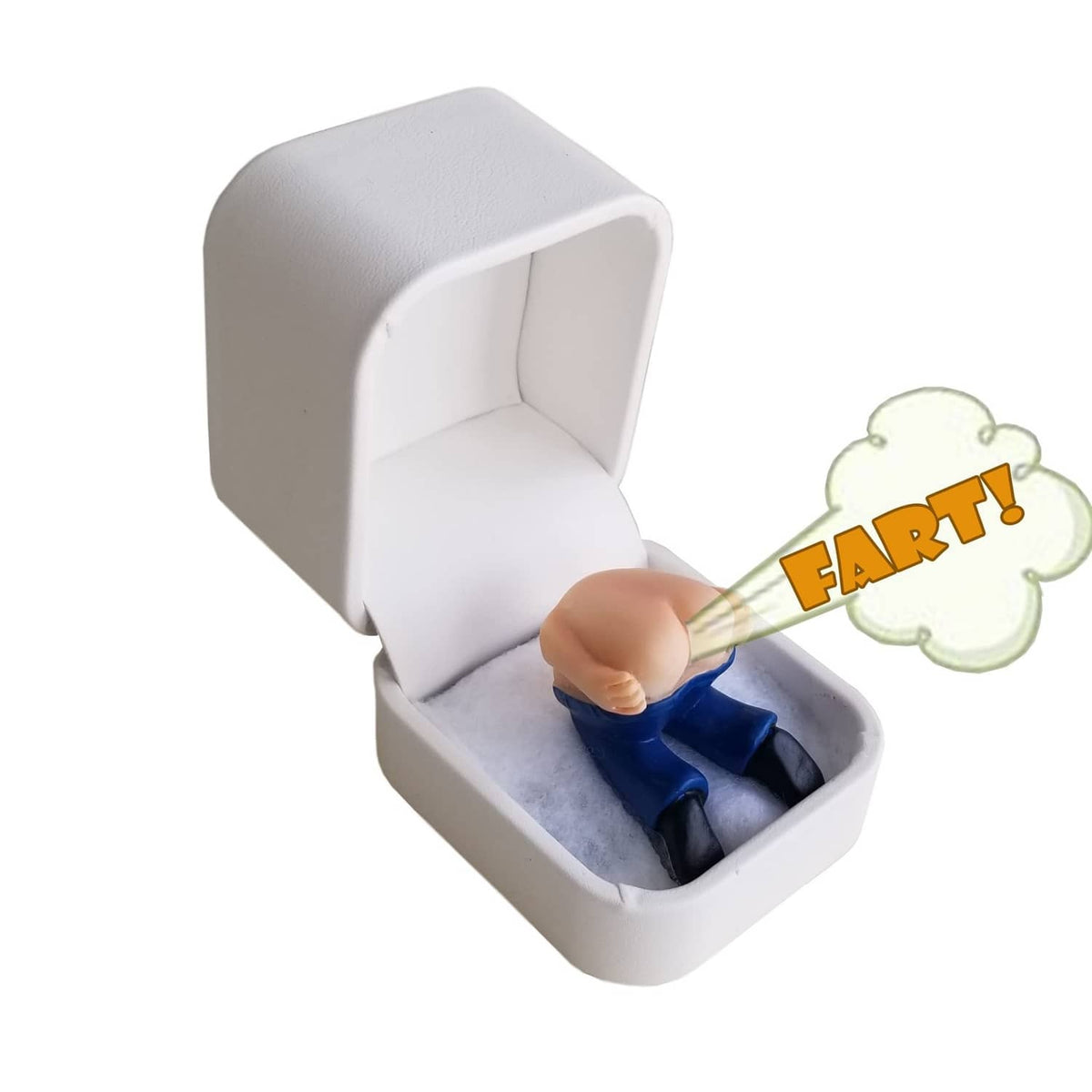 White ring gift box open; blue prank ring in gray insert with fart icon