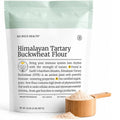 Organic Himalayan Tartary buckwheat flour pouch with wooden scoop of light-colored powder