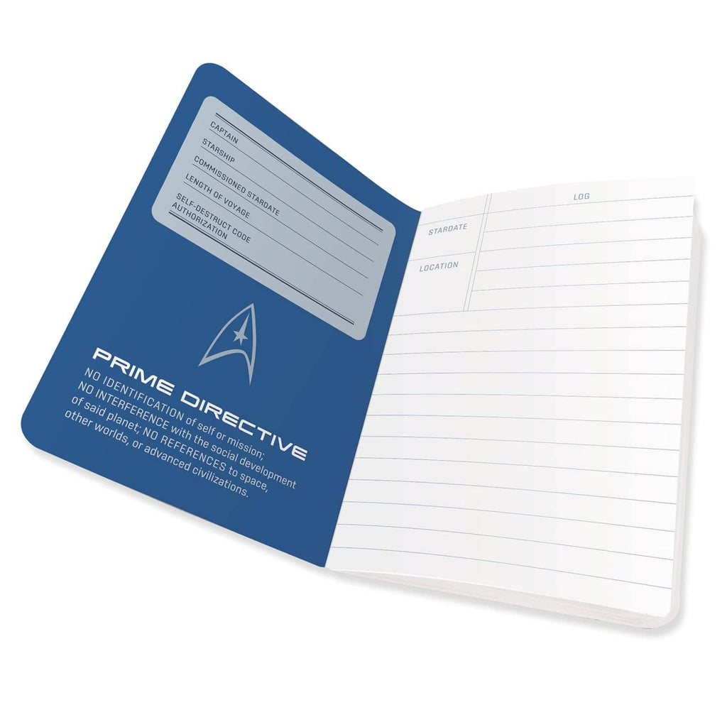 Captain's Log journal open to white ruled pages with blue Prime Directive cover