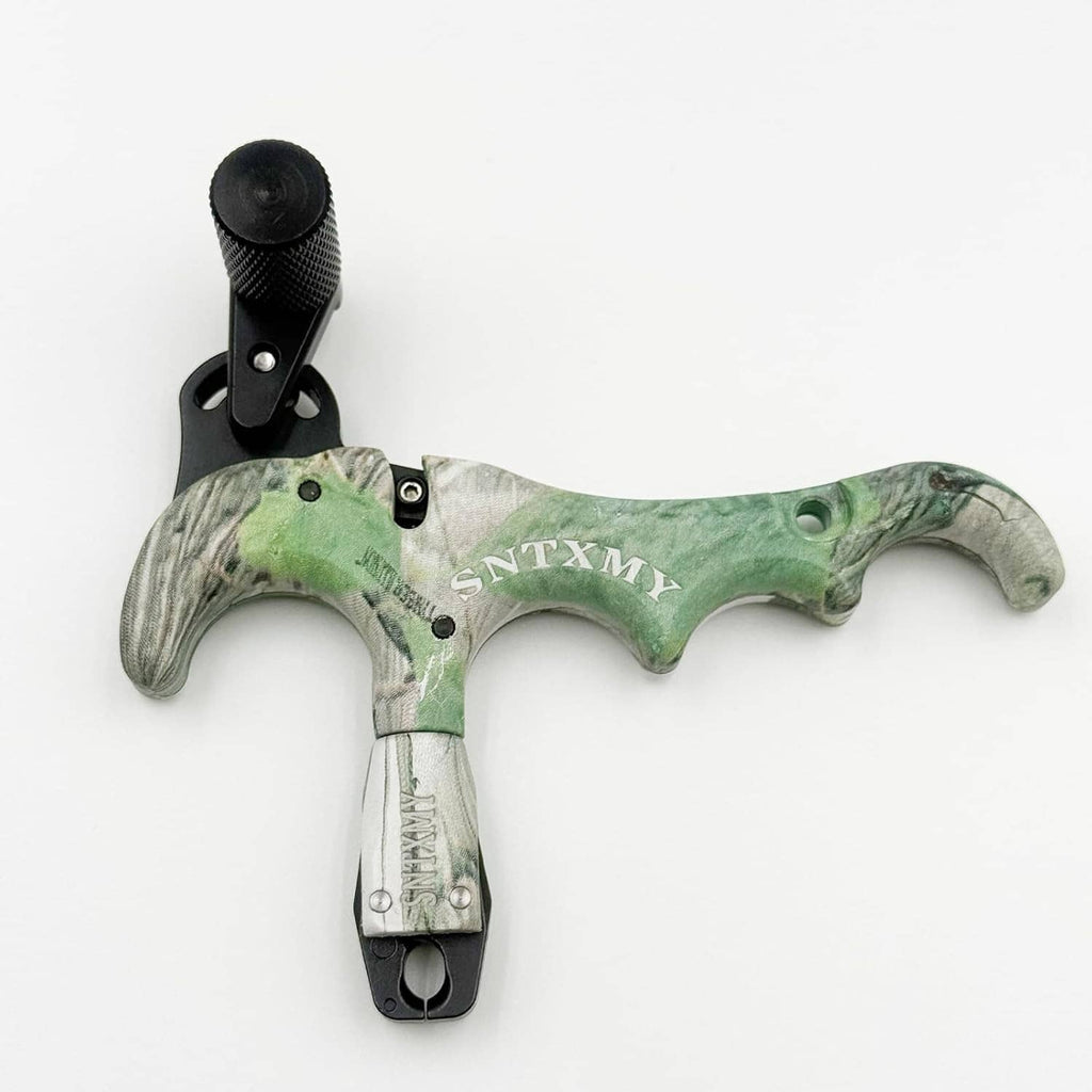 Green camo bow trigger release with black strap and metal trigger piece