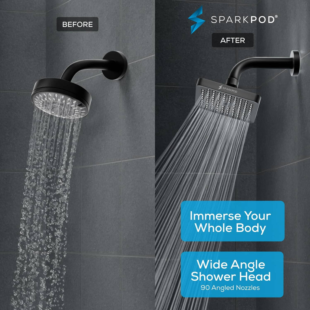Midnight black matte rain shower head producing wide rainfall spray from many nozzles