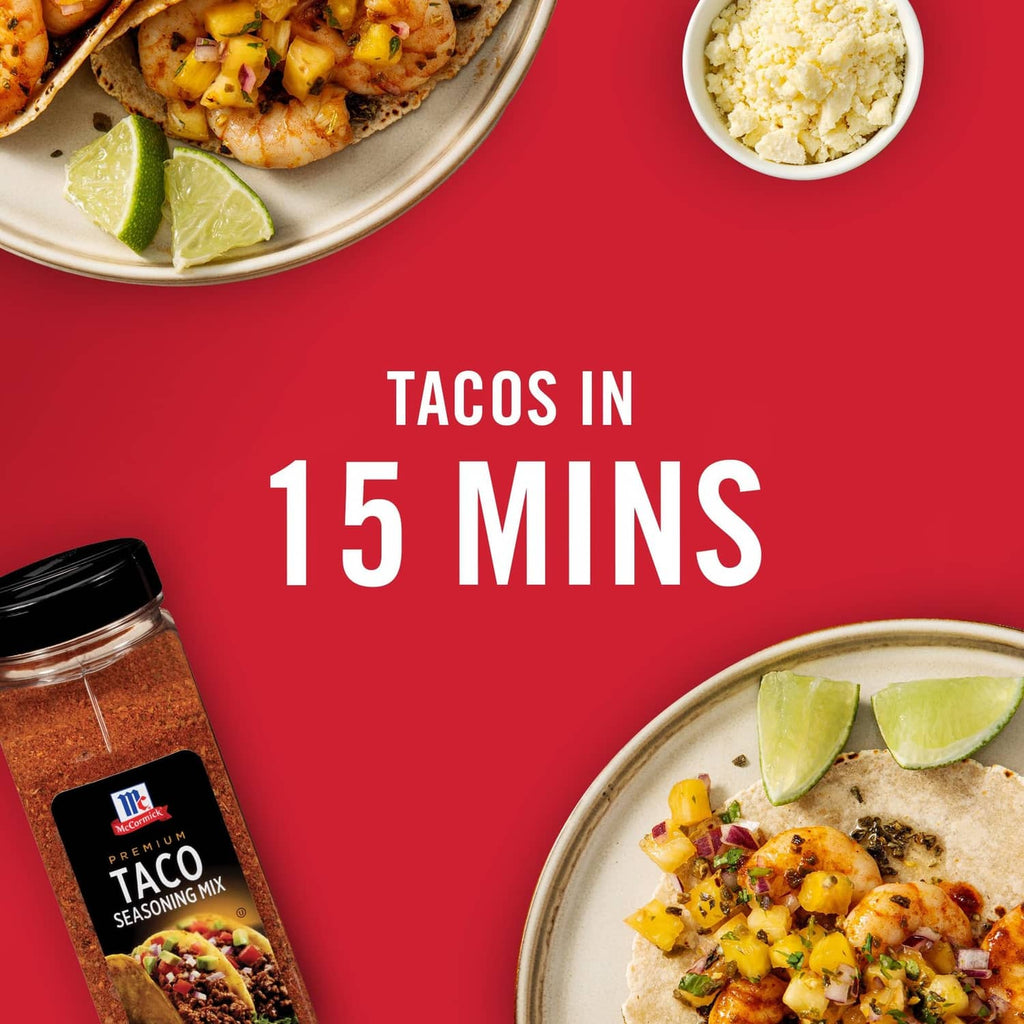 McCormick Taco Seasoning Mix jar partially shown beside tacos with lime wedges