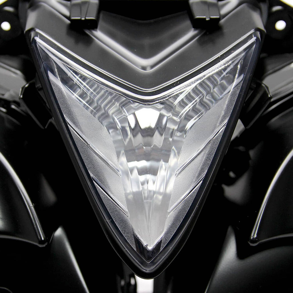 Front motorcycle headlight assembly with clear lens and black housing