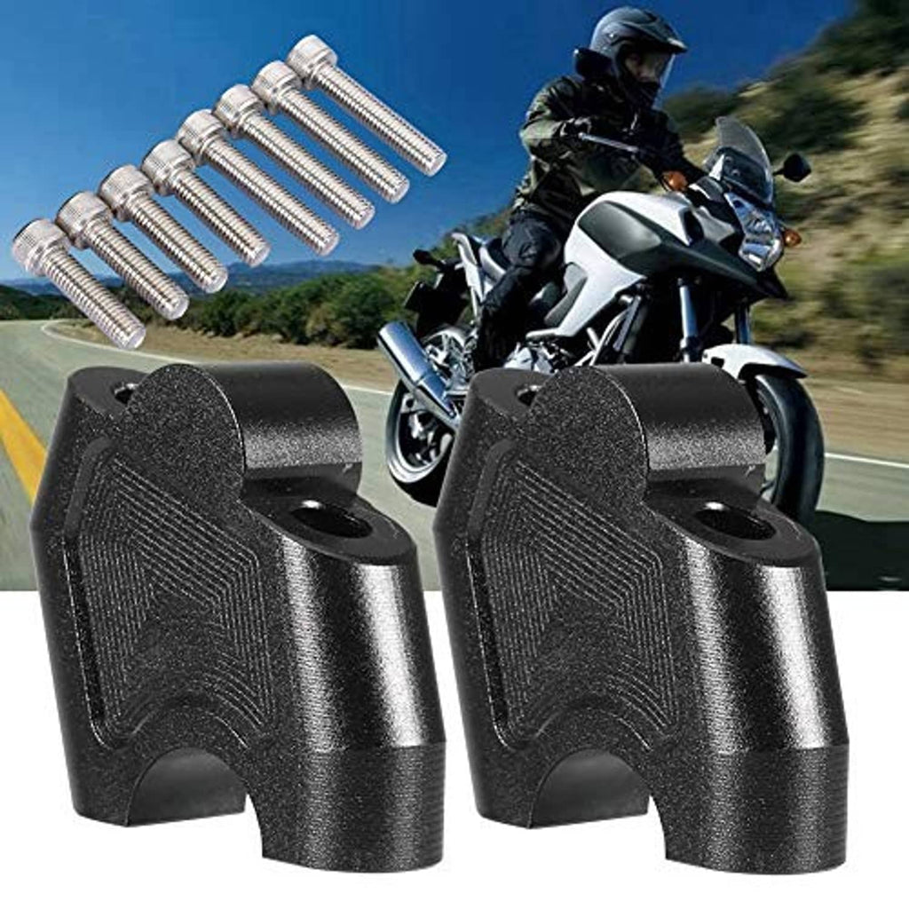 Black CNC handlebar risers with silver mounting bolts alongside a sport motorcycle