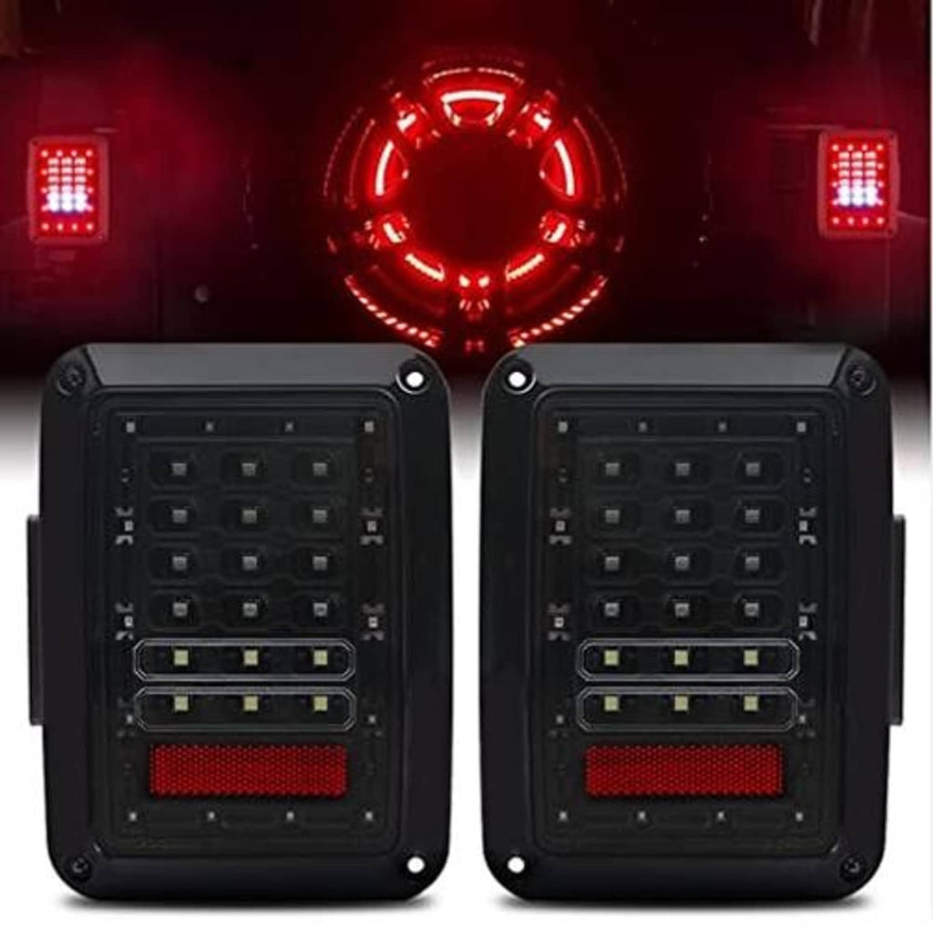 LED tail light pair with red light patterns, black housings and clear lens