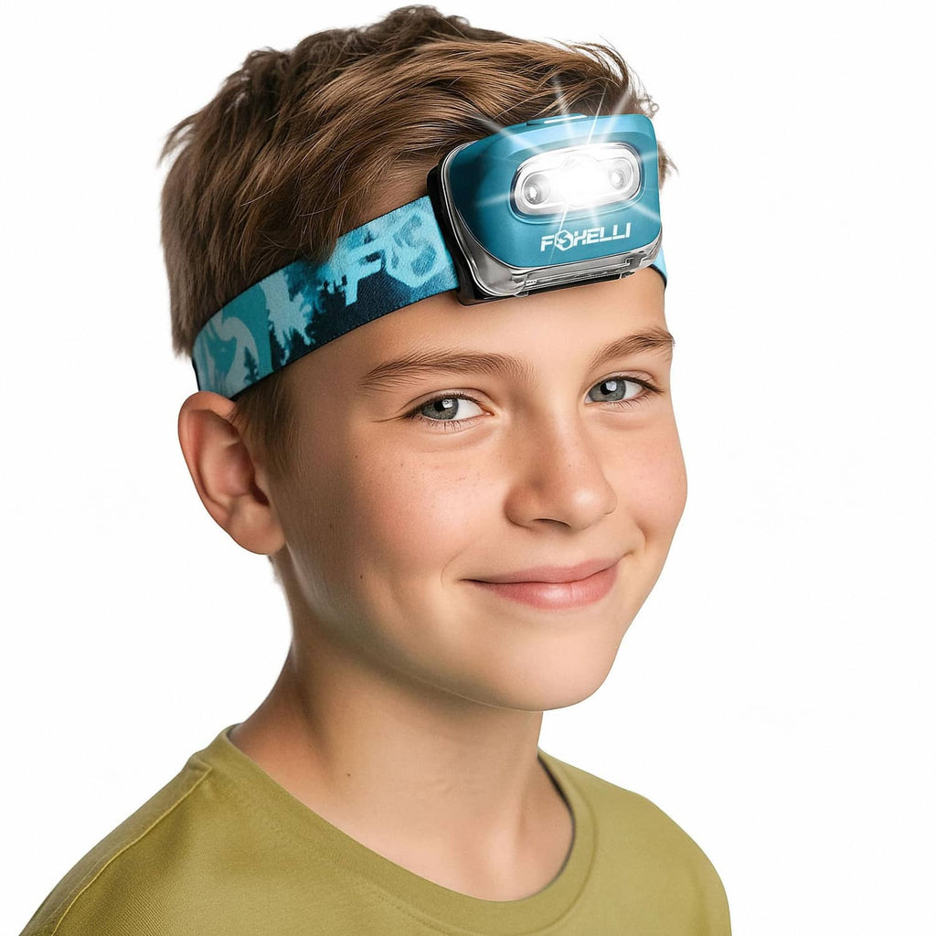 Foxelli LED headlamp on child with blue patterned headband and front light