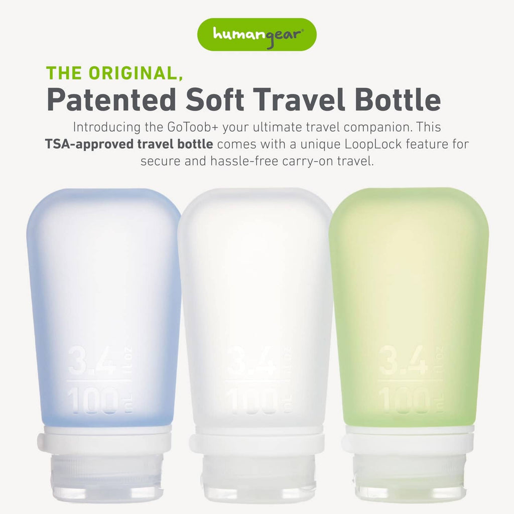 Three refillable silicone travel bottles, blue, white, and light green, closed tops